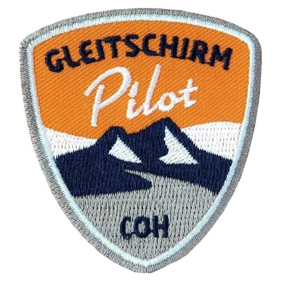 gleitschirm-paragliding-pilot-flug-abzeichen-aufnaeher-patch-rund-heroes-gelb_jpeg